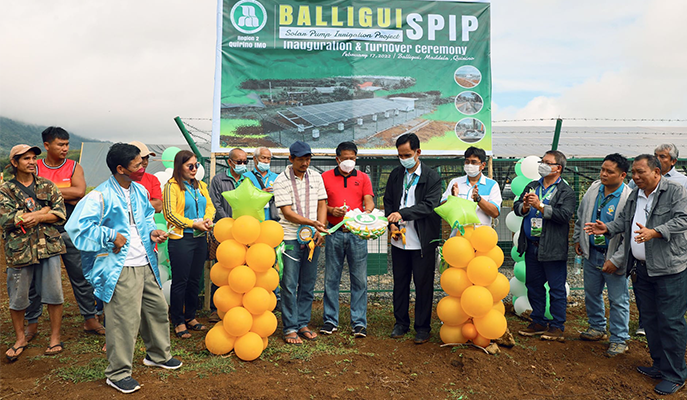 Ribbon-cutting ceremony at the Balligui Small Scale Irrigation Project with officials and attendees